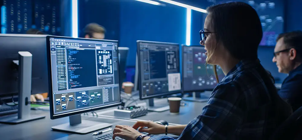 Woman working in a network operations center 
