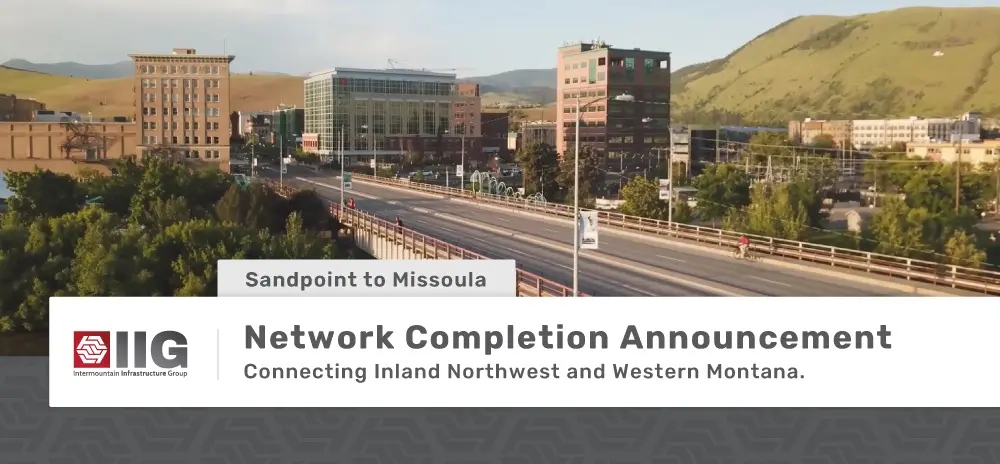 Network Completion Announcement: Sandpoint to Missoula. "Connecting Inland Northwest and Western Montana." City bridge of Missoula, MT