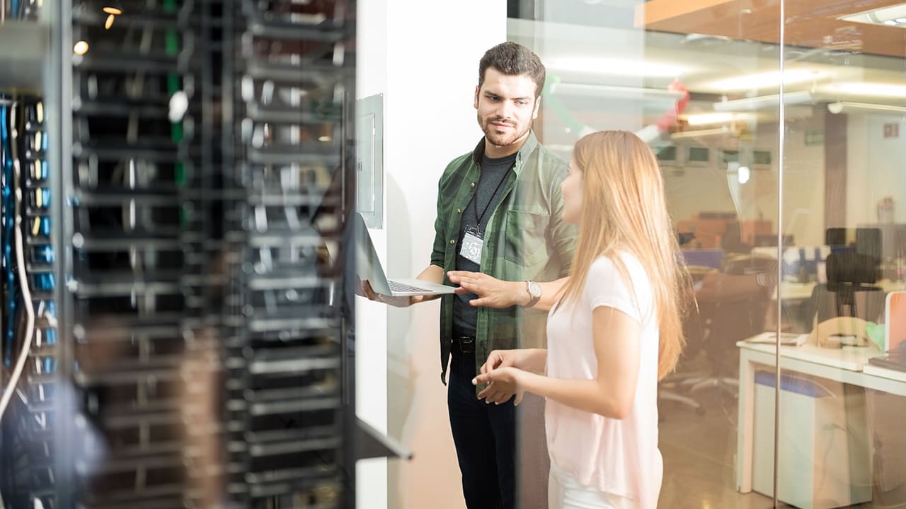People working in a data center